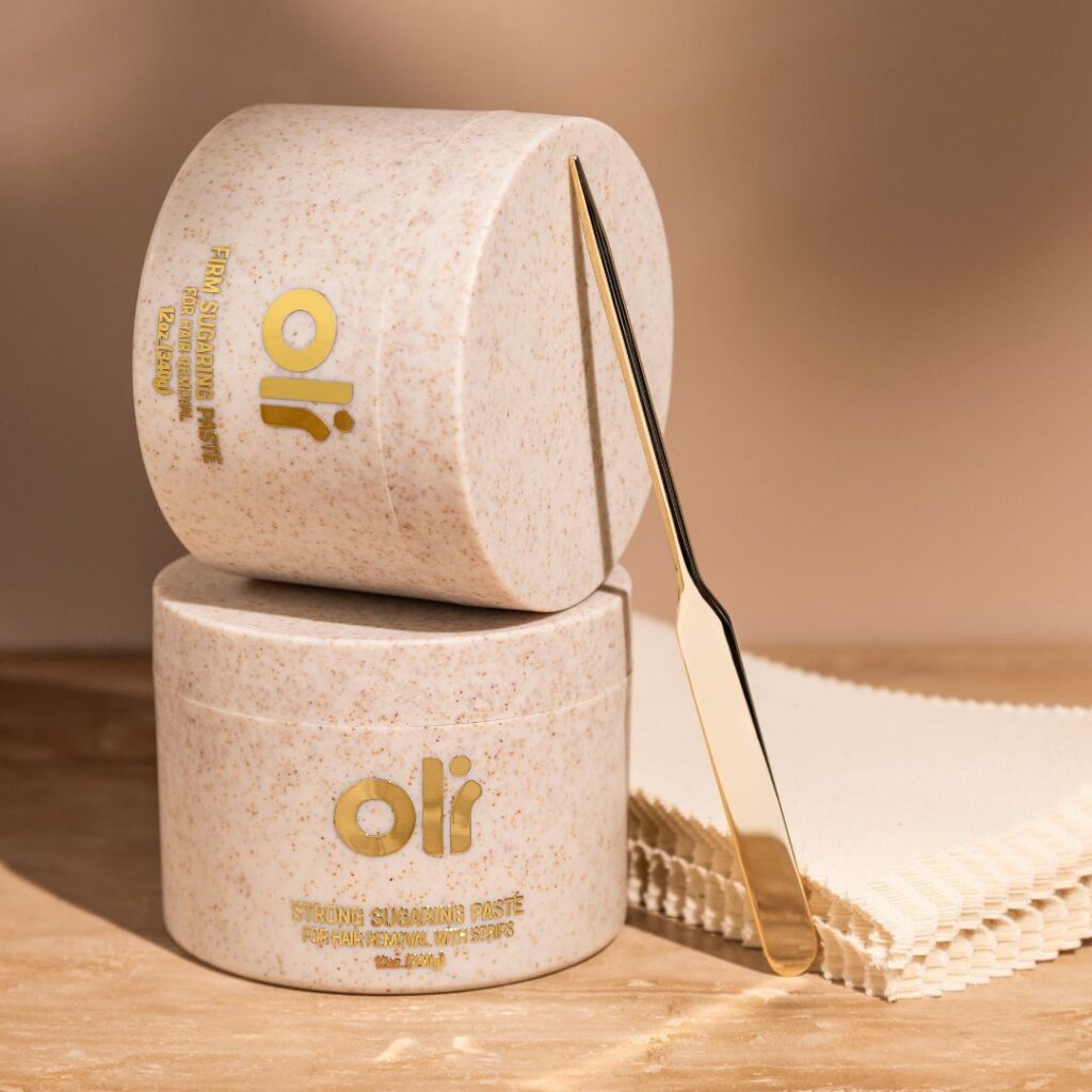 Complete Set of The Deuce sugaring kit - features two 12 oz sugar waxes, 50 strips, and a reusable applicator for natural at-home hair removal