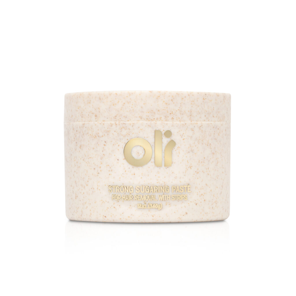 Jar of strong sugaring paste for strip sugar wax hair removal - formulated for coarse hair on areas like underarms and bikini line